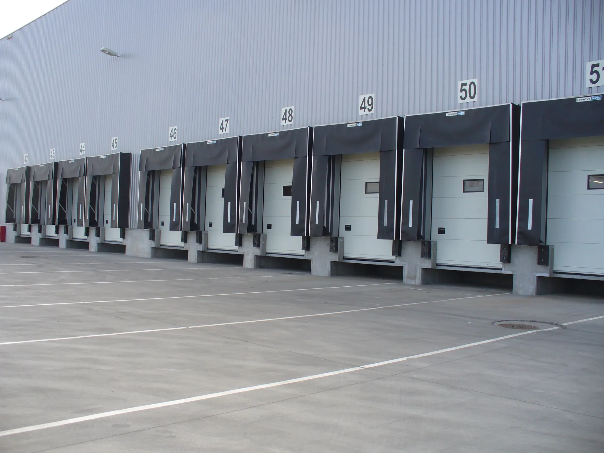 Loading bays at a distribution centre with sectional doors