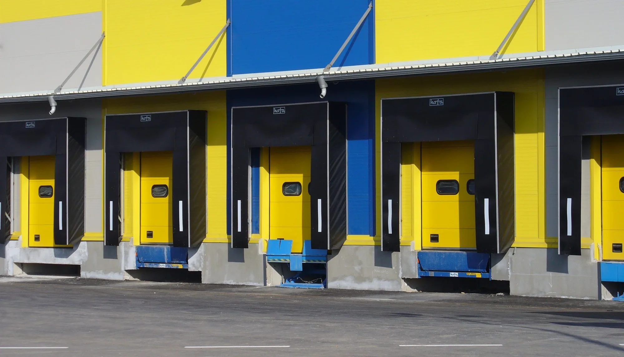 A row of loading bays with dock shelters