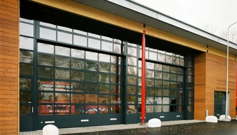 Industrial building with glazed sectional doors